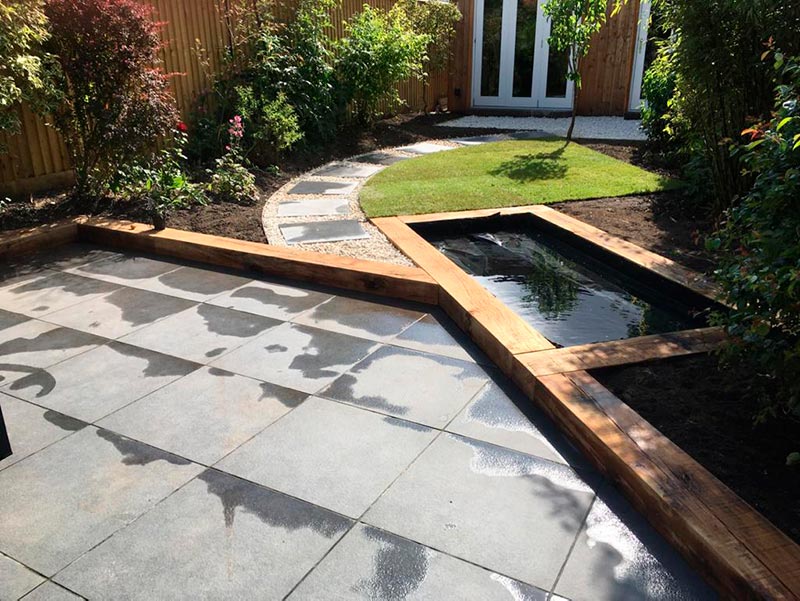 slate paving and bespoke pond | Landscaping Monmouthshire