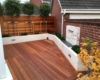 bespoke timber deck and rendered walls for raised planting beds | Landscaping Monmouthshire
